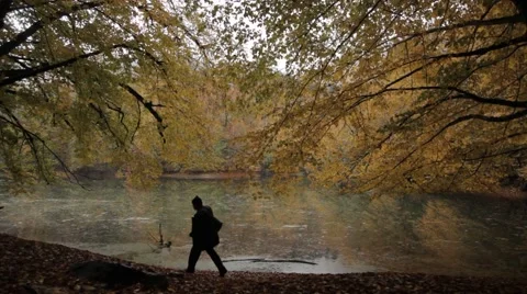 Man walking in the lake 스톡 동영상 43281445
