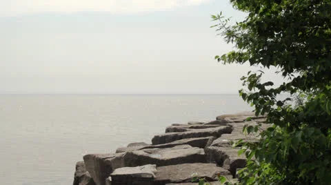 Man walking on large boulders Stock Footage 25422111