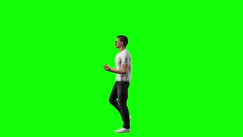 Man walking lightly as part of warmup on green screen chromakey Stock Footage 328639173