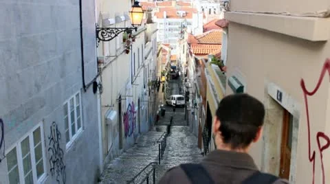 Man walking in Lisbon Stock Footage 22197894