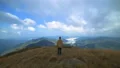 The man walking on a mountain with a beautiful view 4k or 4k+ Resolution