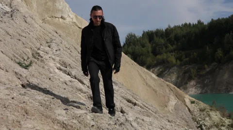 Man walking on the mountain at the camera 스톡 동영상 35581372