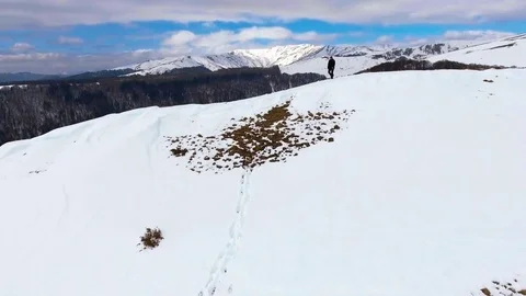 Man Walking Up a Mountain Video stock 75057287