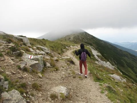 Man walking on the mountain Stock Photos