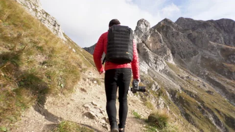 Man walking on mountain ridge epic drone view dolomites. Stock Footage 143366153