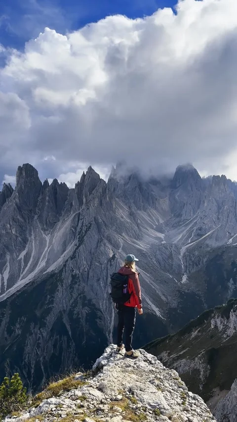 Man Walking on Mountain Ridge – Tre Cime Landscape Stock Footage 330437376