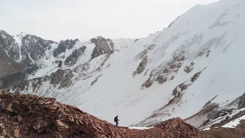 Man walking at the mountain summit aerial landscape Stock-Footage 171226211