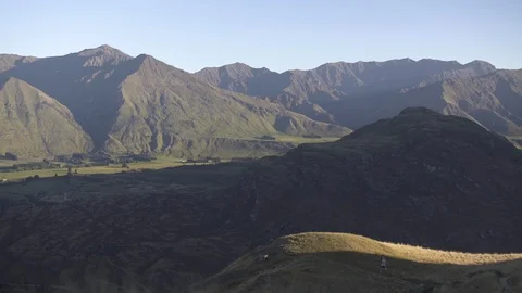 Man walking on the mountain top Stock Footage 95011968