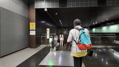 A man is walking in a MRT station 스톡 동영상 318093798