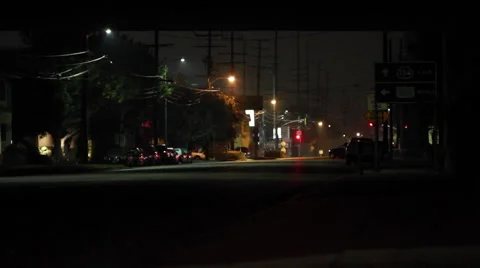 Man walking at night Stock Footage