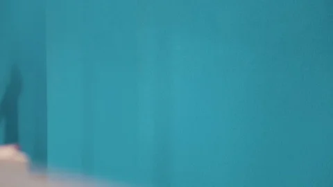 The man is walking in the office Stock Footage 75950496