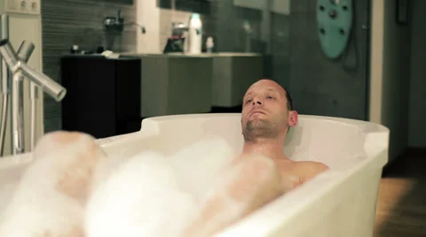 Man walking out of the bath HD | Stock Video | Pond5