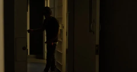Man Walking out of Jail Cell, Free from Prison, Dark Moody Liminal Video stock 278116134