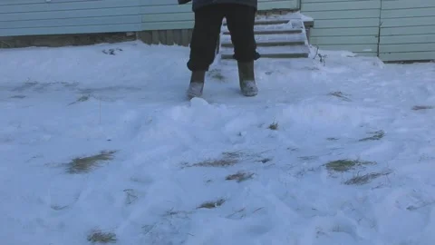 Man walking outside in winter Stock Footage 169328244