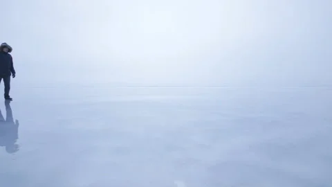 Man walking over the ice Stock Footage 101951517