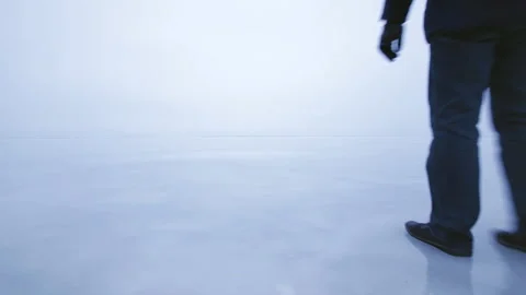 Man walking over the ice Stock Footage 101951526