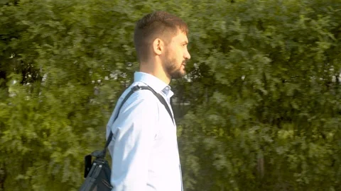 Man walking in the park Stock Footage 114695203