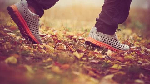Man walking in park Stock Photos