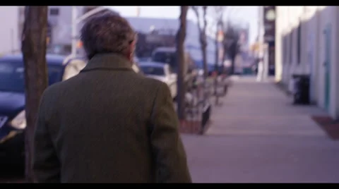 Man walking on the pavement 動画素材 61515652