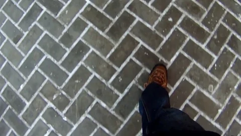 A man is walking on the pavement Stock Footage 70375232