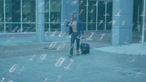 Man walking to pickup taking business phone call and pulling suitcase, binary Stock Footage 333720063