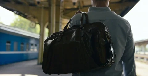 Man Walking On Platform Stock Footage 78772727