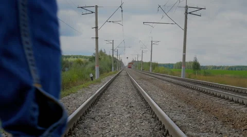 Man walking on the railroad Video stock 67811364