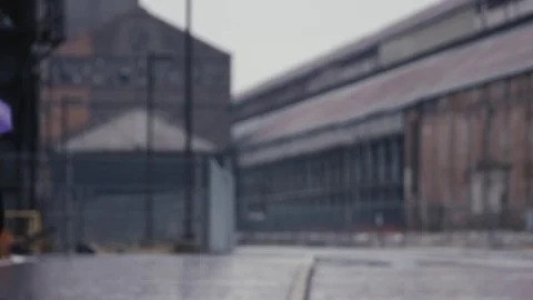 MAN WALKING IN RAIN  240 FPS Stock Footage 79239458