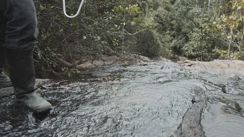 Man walking in river 動画素材 127493212