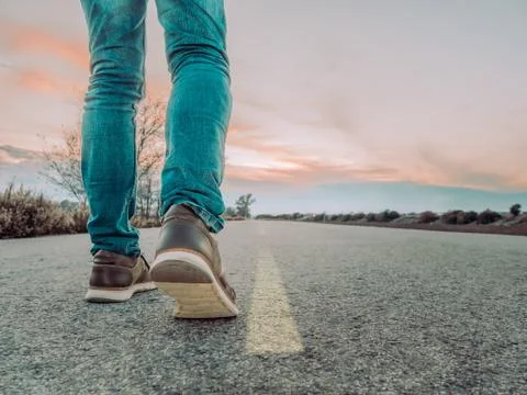 Man walking road Stock Photos