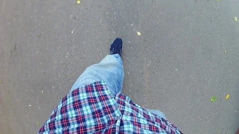 Man walking on the road. Top view of legs. gopro Video stock 91587331
