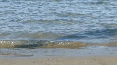 Man is Walking  on Sandy Beach passe by Stock Footage 54915897