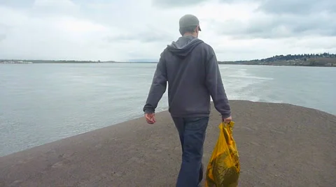 Man Walking on Sandy Path 2 Stock Footage 2596497