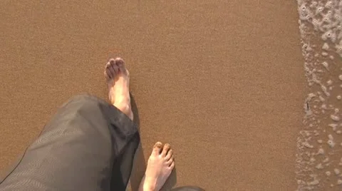 Man walking on seashore 60 Stock Footage 22399285