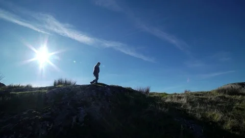 Man walking. silhouette. 4k Stock Footage 77973250