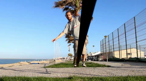 Man walking on a slackline Video stock 22870565