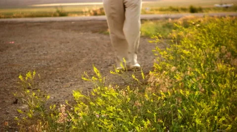Man is walking  slowly on the road Video stock 908901