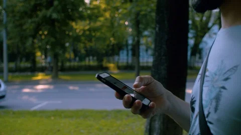 Man walking with smart phone Stock-Footage 114627351