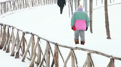 Man walking on the snow Stock Footage 10739174