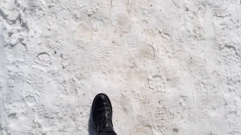 The man is walking on the snow Stock Footage 88711855