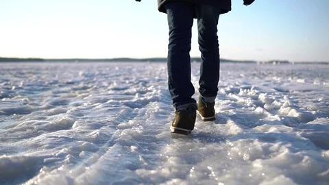 Man walking in the snow Video stock 93330435