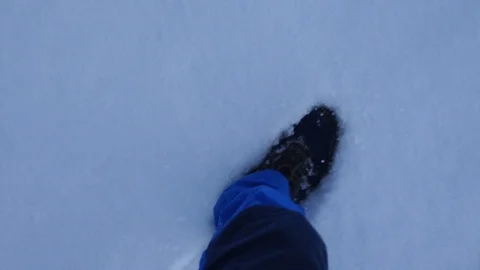 Man walking in the snow. Video stock 126991861