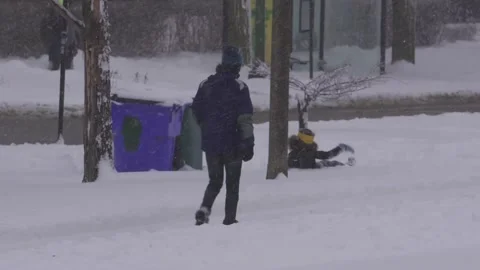 Man walking In the snow Stock Footage 148515390