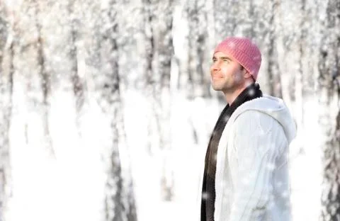 Man walking in the snow Stock Photos