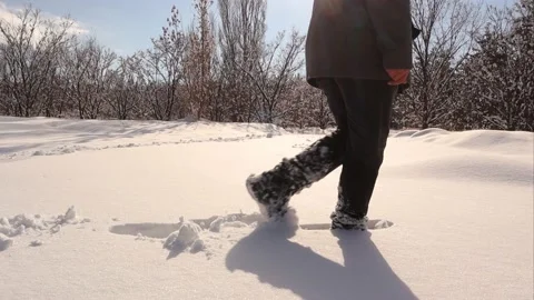 Man walking on snow on the snow in the forest. Erzurum in Turkey Stock Footage 150177157