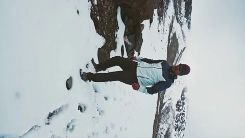A man walking on the snow on the south face of pico de orizaba Stock Footage 211121302