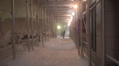 Man Walking in Snow Storm Video stock 65065216