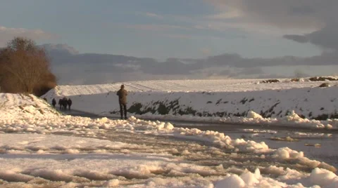 Man walking  in snowy landscape. Stock Footage 59937793