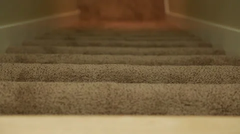 A man walking up stairs Stock Footage 32940476