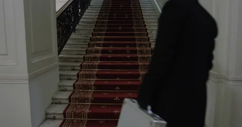 Man walking up stairs Stock Footage 86512474